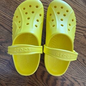 CROCS woman’s Classic Clog in Yellow worn once